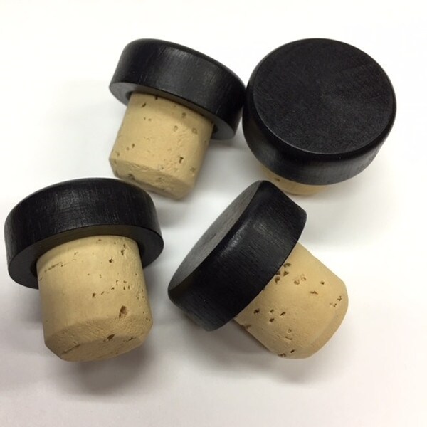 Smooth black cap for liquor bottles